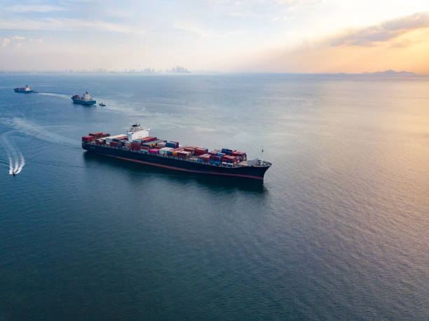 istock Cargo vessel with peaceful sea in beautiful scenic sky 1317052962