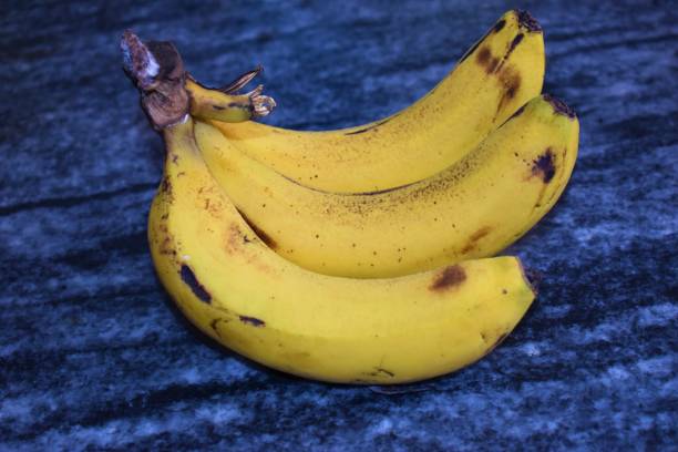 istock closeup of banana on dark background 1317057302