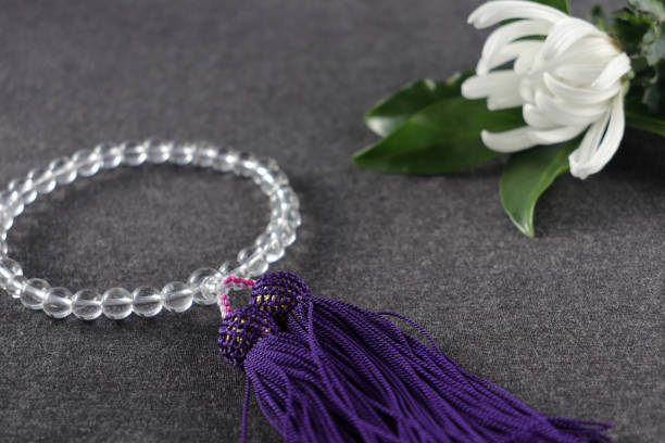 istock Buddhist prayer beads (for women) and a chrysanthemum. 1317058220