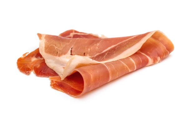 istock Piece of jamon on white background. Close up 1317062773