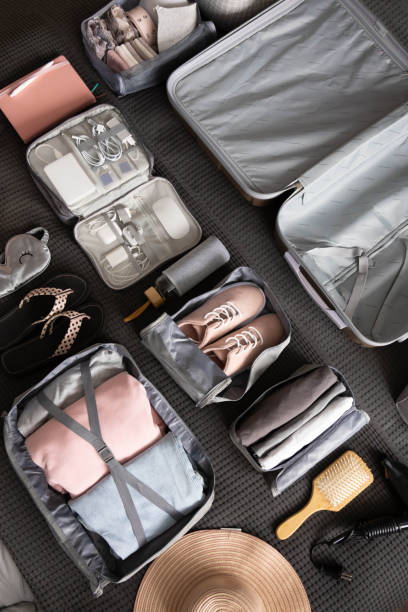 istock Organization of storage carrying necessary things in comfortable case with konmari method on bed 1317065744