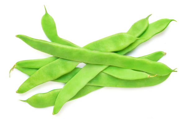 istock Green beans isolated on a white background. Fresh pea pods. Top view. Flat lay 1317067349