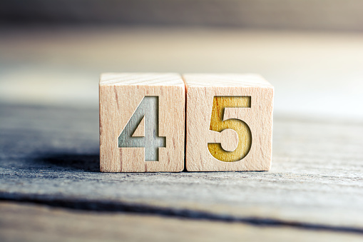 Number 45 Formed By Wooden Blocks On Board