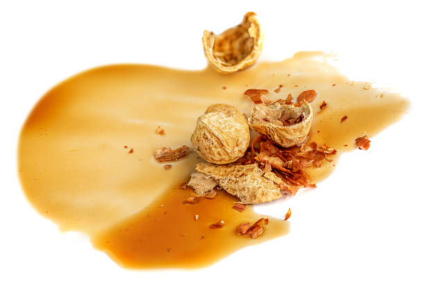 Cracked Dried Peanut in halves on white background