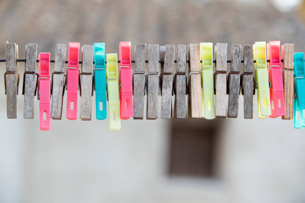 istock Wire clothesline for drying clothes outdoors with tongs 1317073694