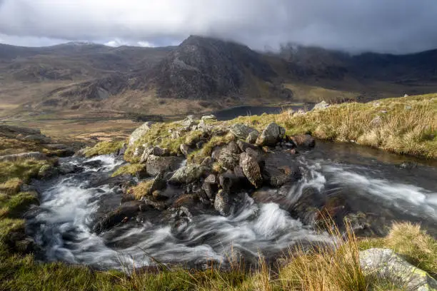 Taken from one of the many streams that flow down the side of the Ogwen valley. Tryfan is the mountain in the rear with Lyn Ogwen below