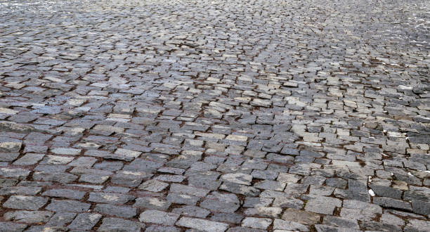 istock Stone pavement in perspective. Old Stone Road 1317076760