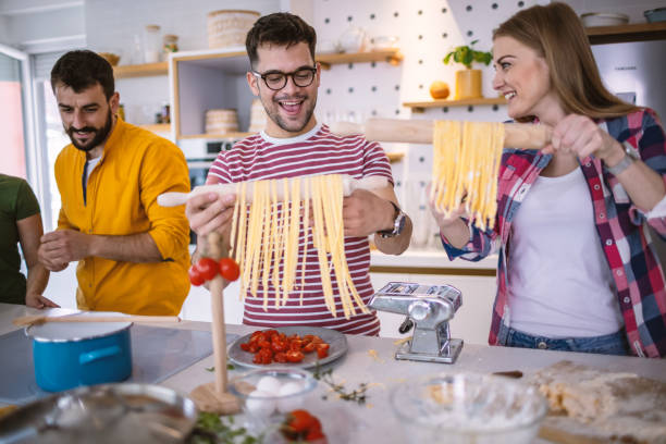 istock Young Couple making homemade pasta 1317080395