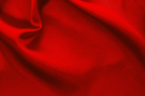 istock Dark red fabric texture background, detail of silk or linen pattern. 1317081549