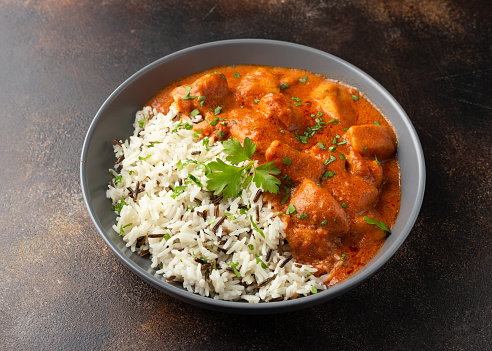 Chicken Paprikash with basmati, wild rice in juicy paprika sauce and parsley