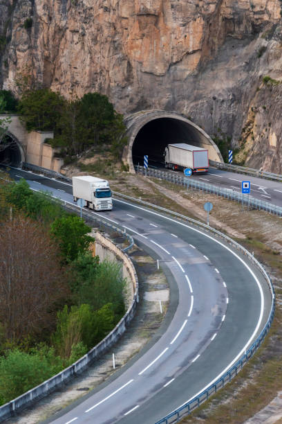 istock Trucks circulating at the entrance and exit of some tunnels in both directions. 1317081942
