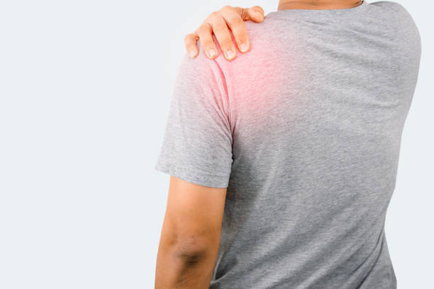 istock Man holding the shoulder Have back and shoulder pain 1317082653