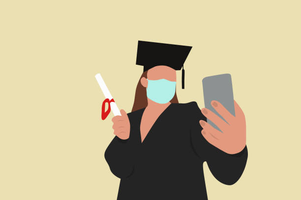 istock Young Graduate Girl Holding Diploma, Taking Selfie With Smartphone And Wearing Protective Face Mask Due To The Covid-19 Pandemic. 1317084959