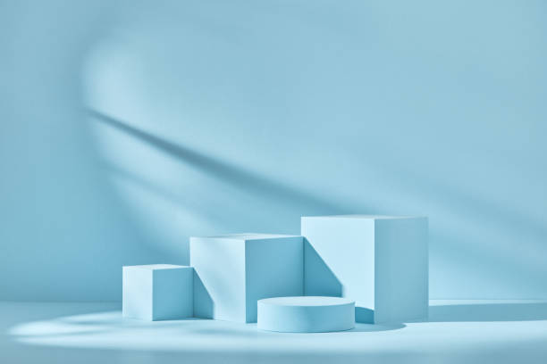 istock Blue background for product presentation with shadows and light. Empty podiums. Mockup. 1317086183