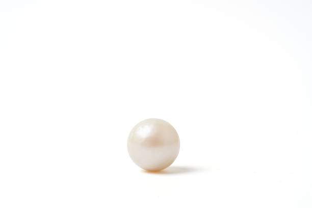 istock pearl necklace isolated on white blackground 1317088246