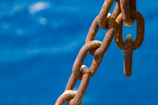 blue nautical backgrounds and rusty metal chain