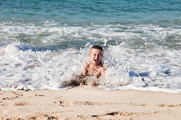 istock Child boy on sea beach 131708967
