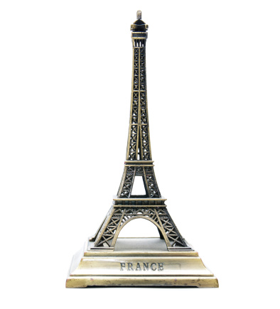 A model Eiffel tower souvenir isolated on white.