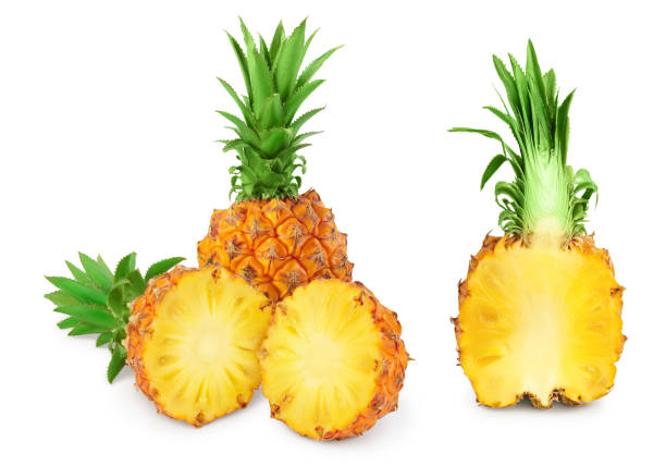 istock pineapple with half isolated on white background with full depth of field 1317091701