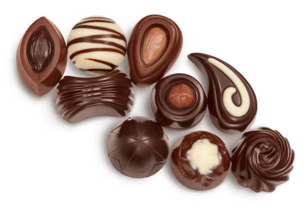 istock Chocolate candy isolated on white background with clipping path and full depth of field. Top view. Flat lay. 1317092017