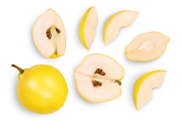 istock Fresh quince with half and slices isolated on the white background with clipping path and full depth of field. Top view. Flat lay 1317092020