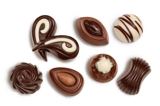 istock Chocolate candy isolated on white background with clipping path and full depth of field. Top view. Flat lay. Set or collection 1317093090