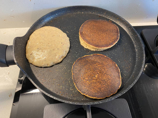 istock Cooking Paleo Pancakes with Almond Flour in Pan. 1317095193