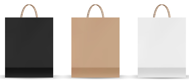 Shopping bag mockups. Paper package isolated on white background. Realistic mockup of craft paper bags.