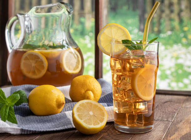 istock Glass of Iced Tea With Lemon Slices 1317097540