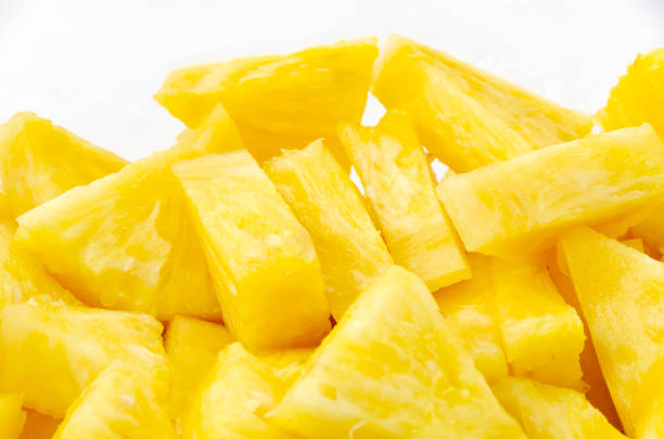 istock Slice of pineapple on white background 1317099567