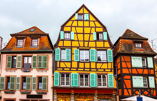 Old traditional colorful half-timbered houses in Colmar, Alsace region, France. Colmar's architectural landmarks reflect centuries of Germanic and French architecture and building materials