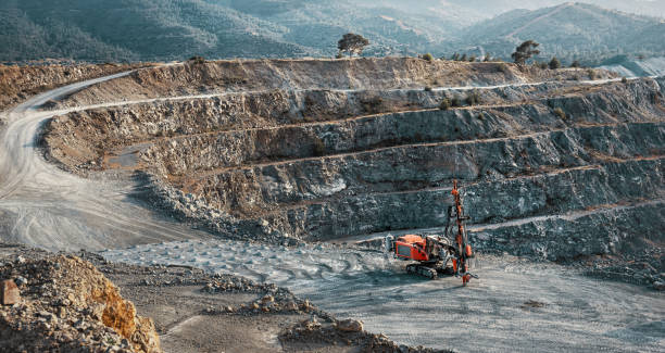 istock Red stone crusher machine in gravel quarry 1317100659