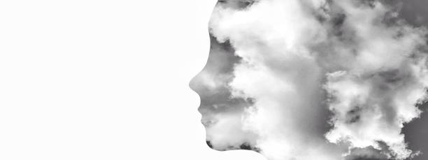 Composite image of abstract female silhouette clouds