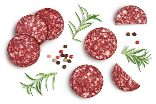 Smoked sausage salami slices isolated on white background with clipping path and full depth of field. Top view. Flat lay.