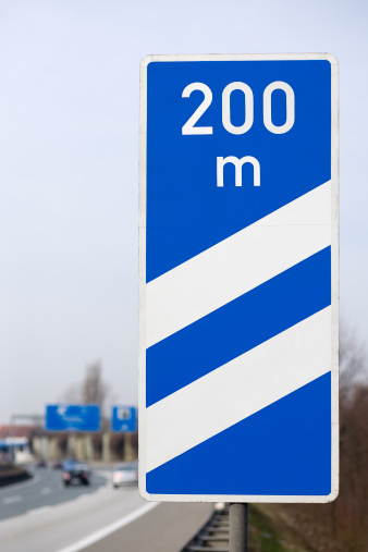 Road sign at the highway - indicates the distance to the next motorway exit: 200m - german road sign
