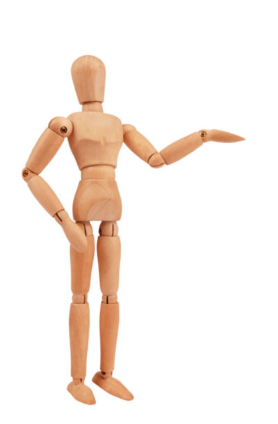 istock Wooden man drawing mannequin figure model concept is presenting something isolated on white background 1317109617