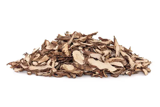 Sweetflag root herb used in traditional chinese herbal medicine over white background. Shi chang pu. Rhizoma acori graminae.