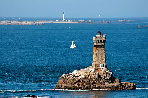 istock Lighthouse in sea, France 131711292
