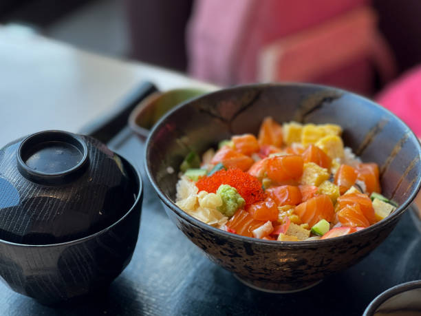 istock Japanese rice bowl topped with salmon sashimi 1317113634
