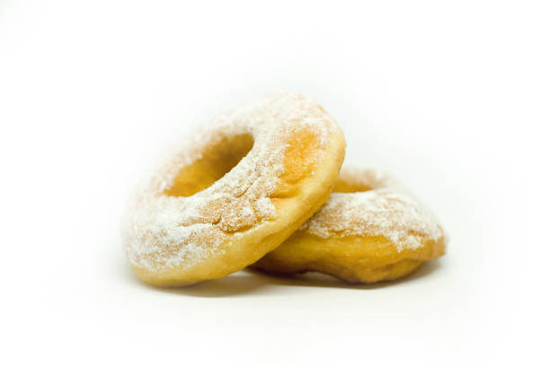 istock Front View Two Stacks of Doughnut with Icing Sugar Topping, Delicious Sweet Donut Cake 1317120458