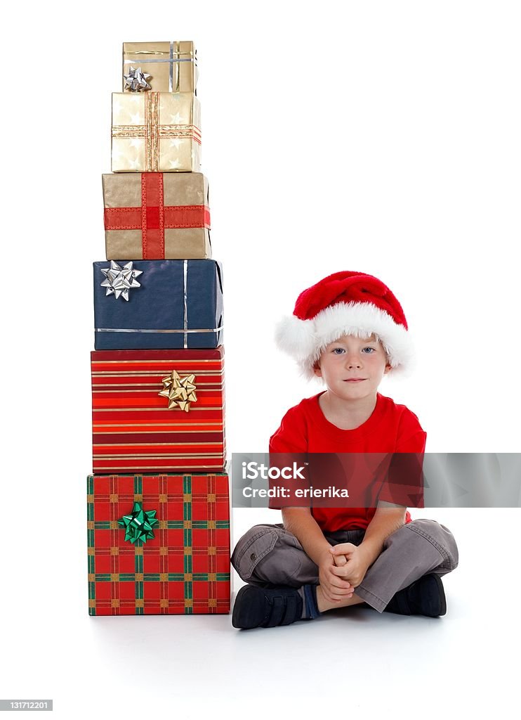 Kind sitzt nahe der Geschenke - Lizenzfrei Feiern Stock-Foto