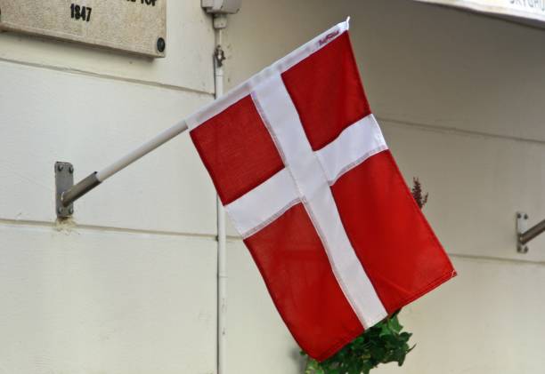 istock Danish flag in a copenhagen street, Denmark. 1317128809