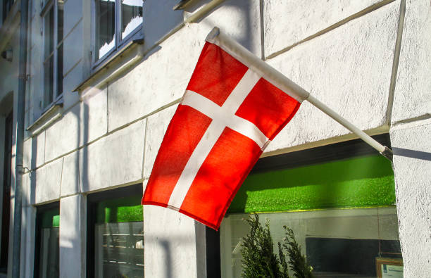 istock Danish flag in a copenhagen street, Denmark. 1317128811