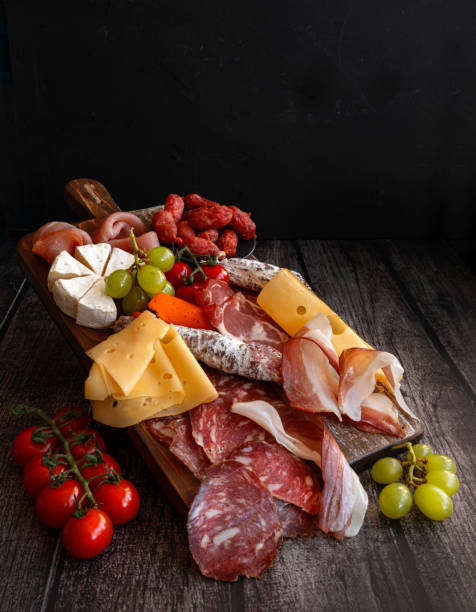 istock antipasti, serrano, herb, black, raw, jamon, chorizo, bread, restaurant, traditional, cold cuts, cheese, delicacy, grissini, buffet, appetizer, sausage, red, smoked, parma, wine, spain, plate, board , food, italian, appetizer, olive, antipasto, meat, tabl 1317131303