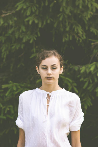 portrait of a confident young teenage girl outdoors.