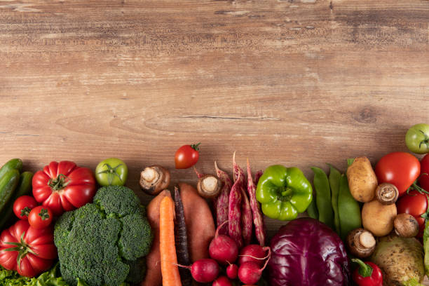 istock Fresh Raw Vegetables on Brown Wooden Table 1317136704