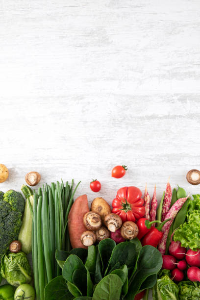 istock Fresh Vegetables on Wooden Kitchen Table 1317137876
