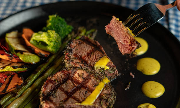 istock Grilled beef steak with asparagus and vegetables 1317137980