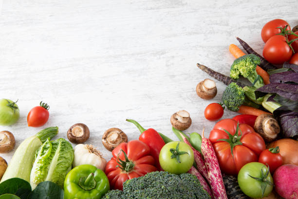 istock Fresh Vegetables on White Wooden Table 1317138268