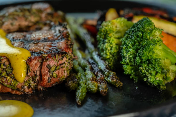 istock Grilled beef steak with asparagus and vegetables 1317138283
